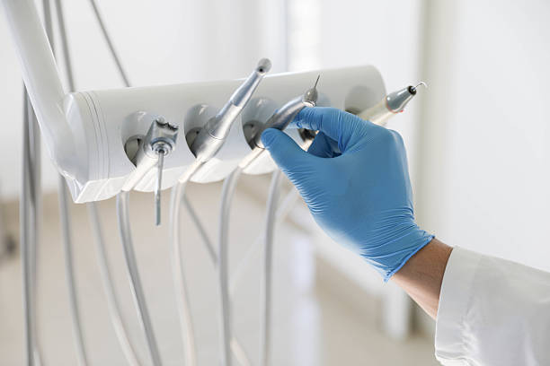 Professional Tooth Extraction technician working in Tishomingo, OK